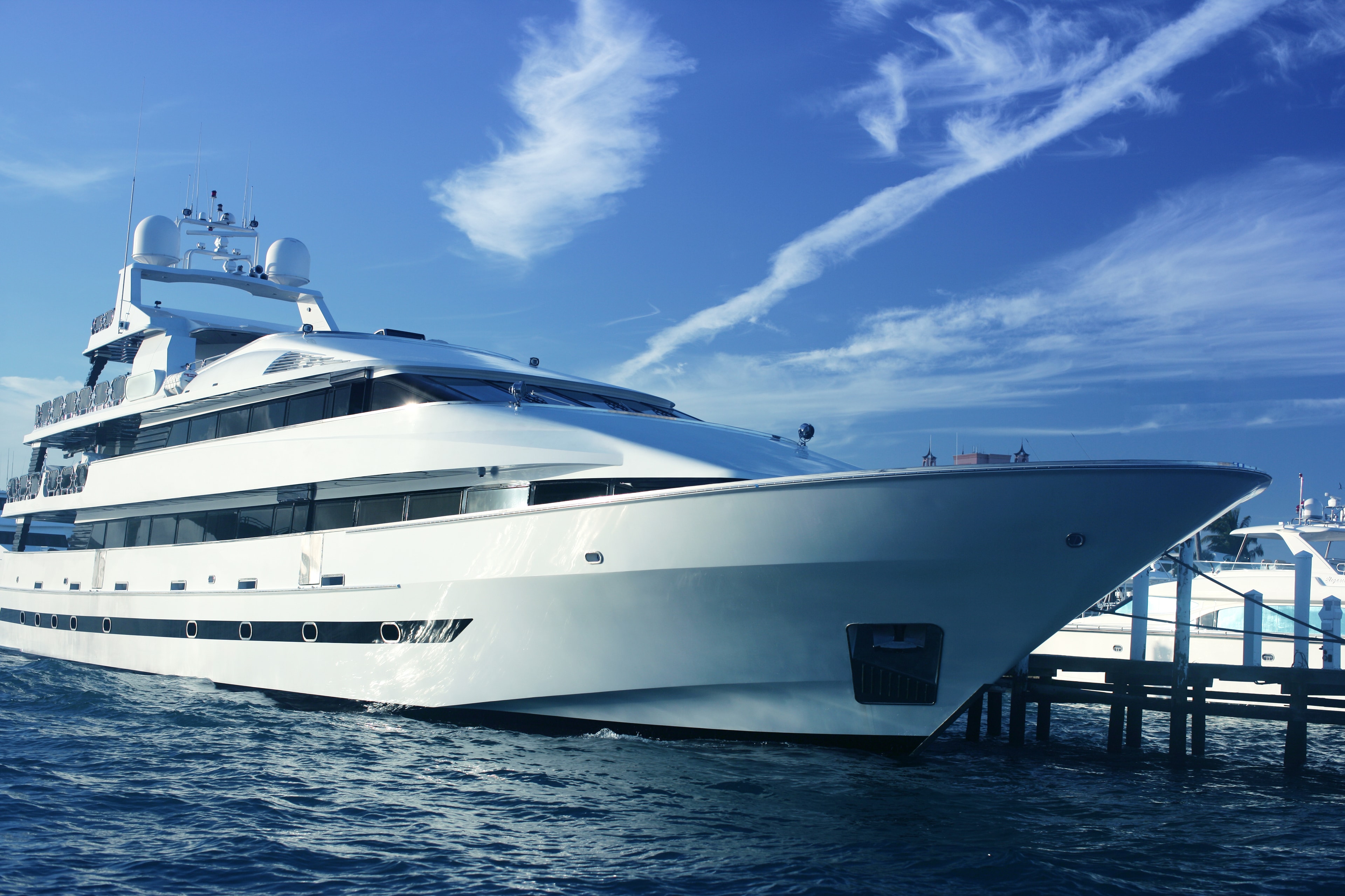 Luxury yacht moored at marina dock